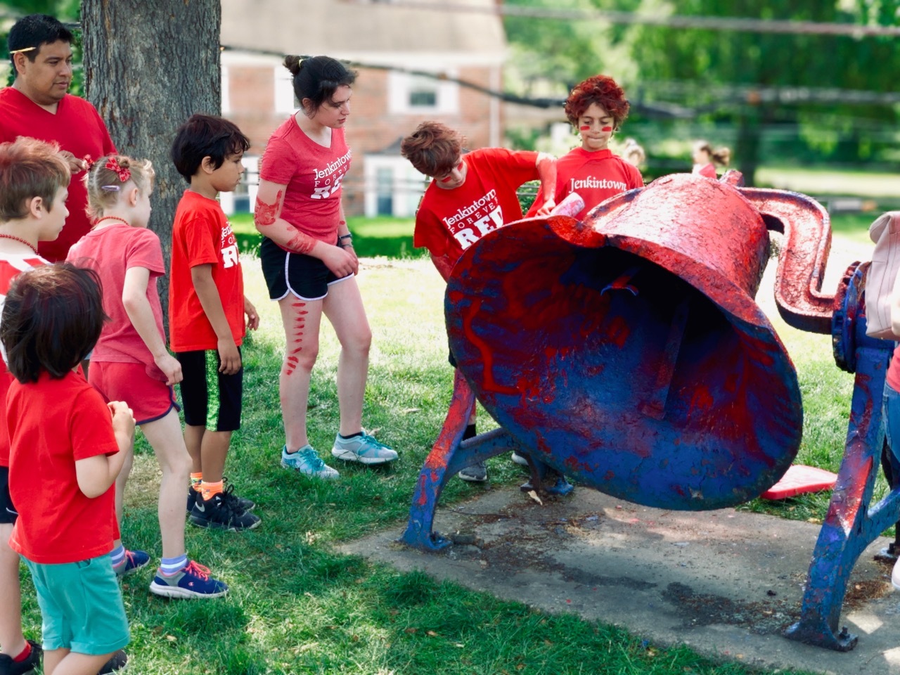 The winning Reds painting the bell at the conclusion of Jenkintown Color Day 2019